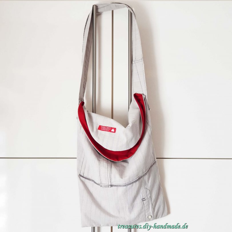 extravagante graukarierte Tasche