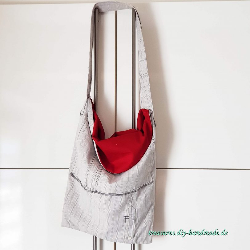 extravagante graukarierte Tasche