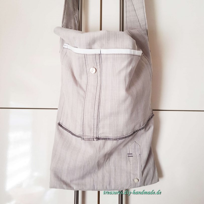 extravagante graukarierte Tasche